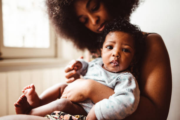 istock little daughter with mom 1181146124