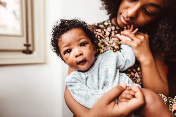 istock little daughter with mom 1181146304