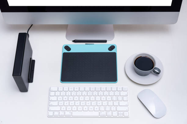 istock White desktop computer keyboard and painting tool coffee combination 1181147062