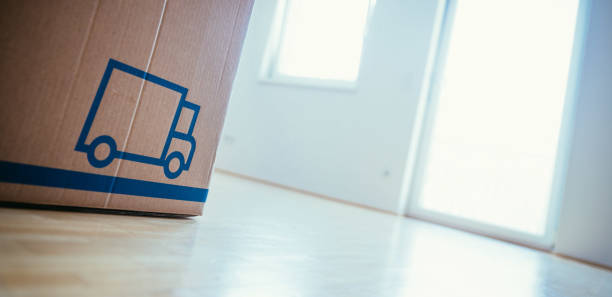 istock Move. Cardboard, boxes and stuff for moving into a new home 1181147079