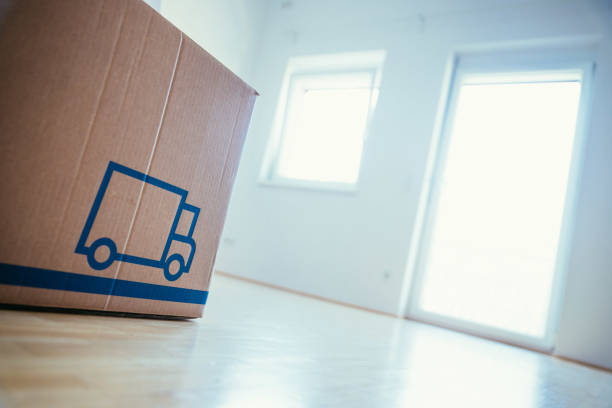 istock Move. Cardboard, boxes and stuff for moving into a new home 1181147134