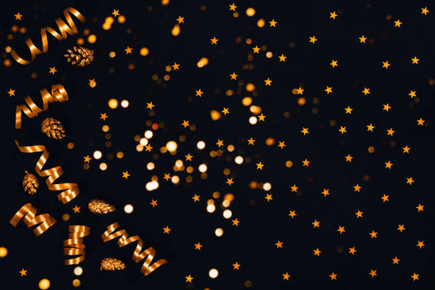 istock Christmas card with tinsel and lights. 1181149760
