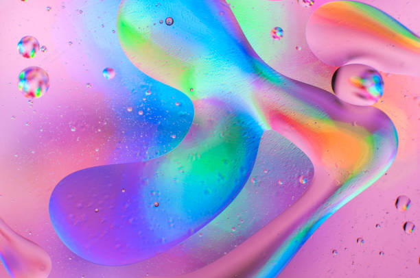 istock Abstract iridescent macro background of oil drops 1181149950