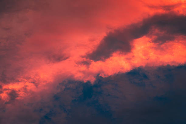 istock Dramatic moody stormy sky with red sunset light. 1181150870