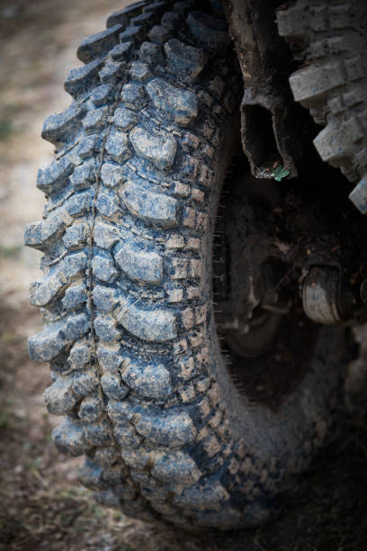 istock Muddy off road tire on a 4x4 car 1181155378