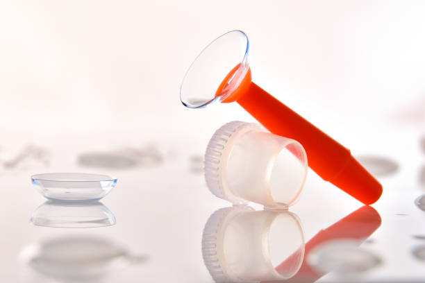 istock Contact lens in an applicator on a glass table front 1181156778