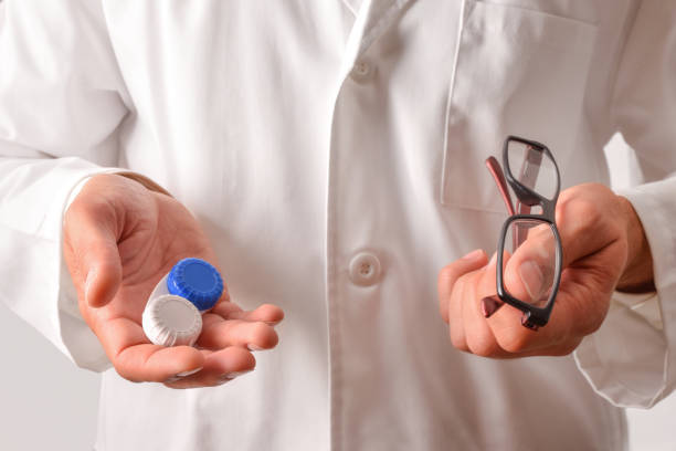 istock Ophthalmologist with white coat showing elements for sight correction 1181157031