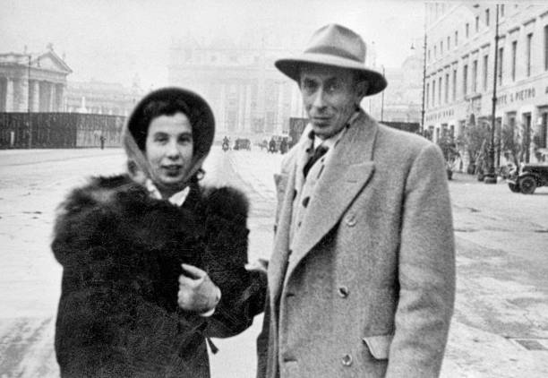 istock 1935, Young couple visiting St. Peter, Rome, Italy 1181158008