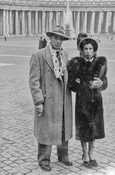 istock 1935, Young couple visiting St. Peter, Rome, Italy 1181158013