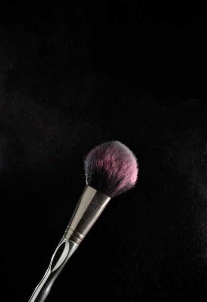 istock Makeup brush and colourful powder 1181160642