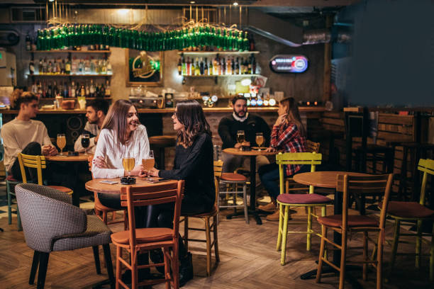 istock People sitting in bar 1181162290
