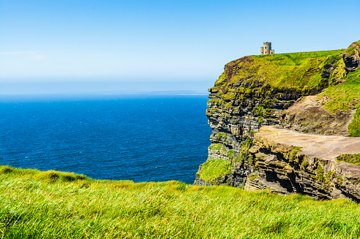 Ireland - May 26, 2015: O'Brien's Tower, marks the highest point of the Cliffs of Moher, on the western Atlantic Ocean coastline of Ireland in the Burren region of County Clare