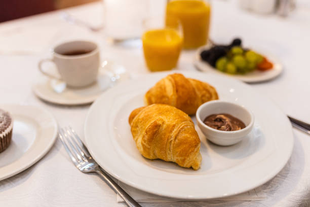 istock Breakfast with croissants and cup of coffee 1181170787