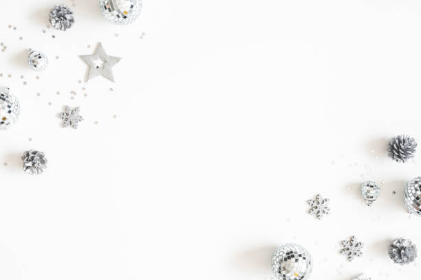 istock Christmas composition. Christmas silver decorations on white background. Flat lay, top view, copy space 1181173379