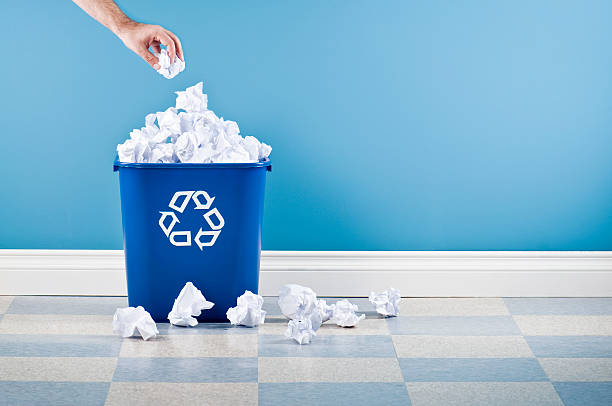 Recycling Container With Crumpled Paper stock photo