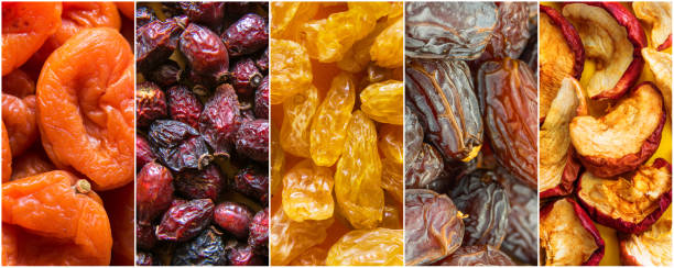 Collage set of organic sun dried fruits dehydrated apricots yellow golden raisins dates rose hips apples on long banner. Healthy diet wholefoods vegan superfoods. Creative food poster collage conjunto de frutos secos orgánicos de sin agua deshidratados albaricoques amarillos pasas doradas fechas rosa mosquetas manzanas en bandera larga. dieta saludable alimentos integrales vegano concepto de superalimentos. cartel de comida creativa