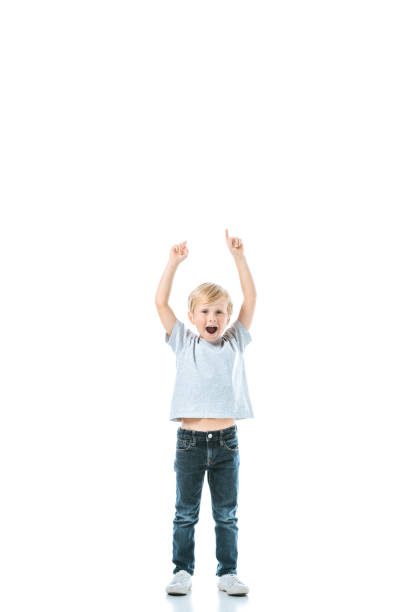 istock excited boy with opened mouth pointing with fingers isolated on white 1181196313