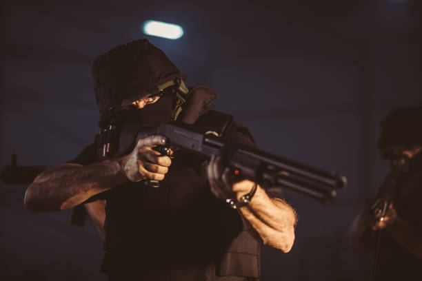 istock Special police force man with shotgun 1181197673