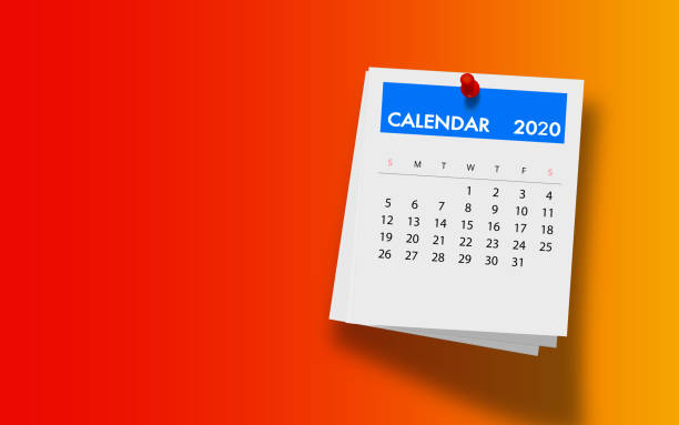 istock 2020 Calendar on Note Pad Against Colorful Background 1181197758