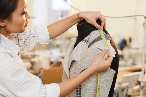 istock Woman takes measurements 1181201467