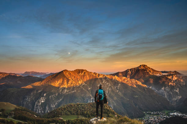 istock Hiker Looking Valley From Mountain Top 1181202335