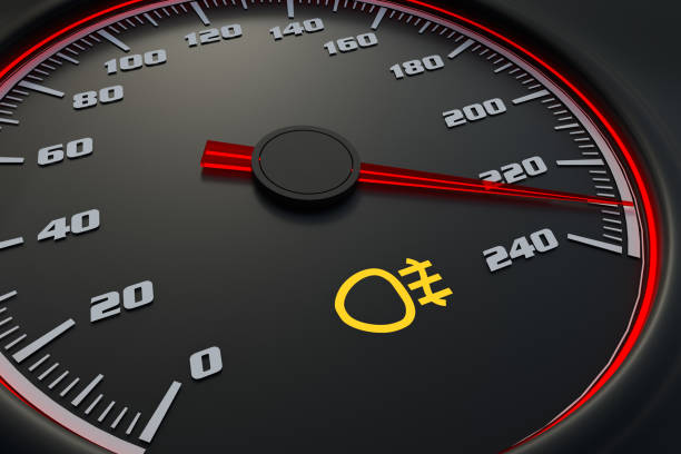 istock Rear fog light on car dashboard 1181204569
