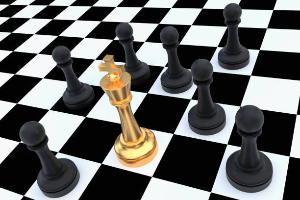 istock Golden King surrounded by black pawns - chess trap concept 1181204901