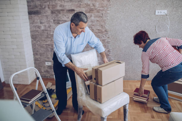 istock An older married couple is moving into a new apartment 1181205628