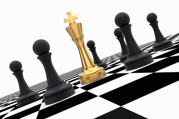 istock Golden King surrounded by black pawns - chess trap concept 1181206106