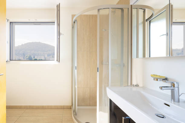istock Front view with sink with shower and open window on the Swiss hills 1181208102