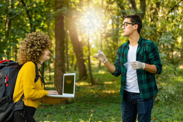 istock Scientist ecologist in the forest take samples of plants. 1181209031