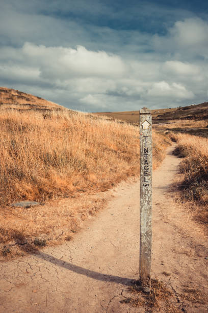 istock Sign Post for Tintagel Castle on the South West Coast Path, Cornwall, UK 1181209668