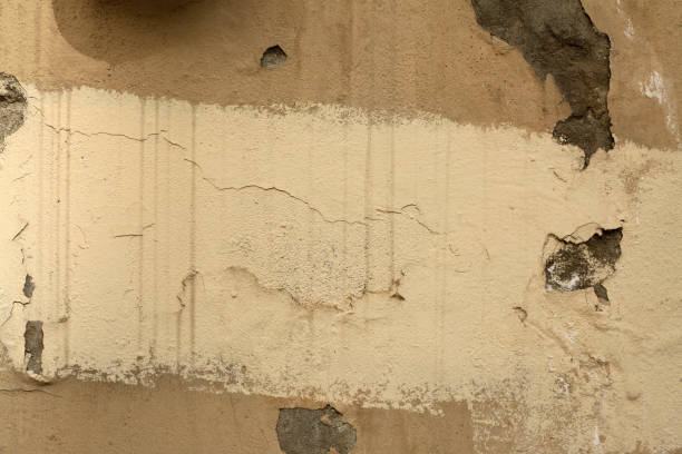 istock Yellow grunge concrete wall background 1181211166