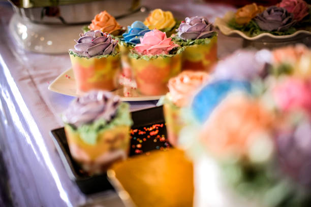 istock wedding birthday cupcakes with sweet rose flower 1181211351