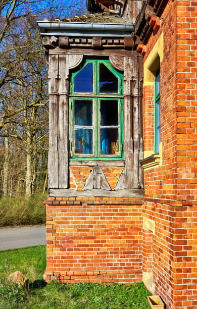 istock Old antique window with wooden window frame. 1181214986