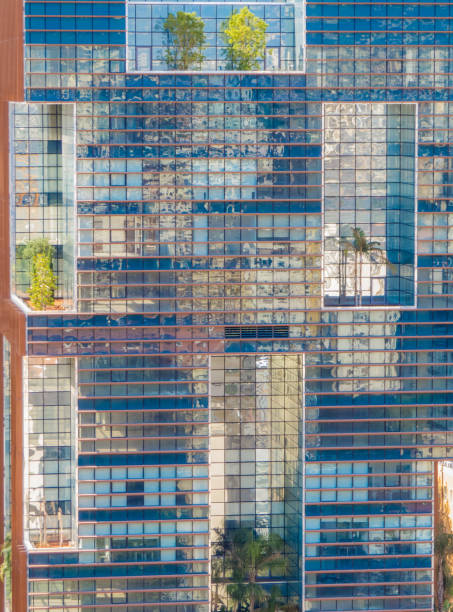 istock Modern glass building with trees 1181215724