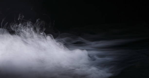 realistic dry ice smoke clouds fog - wind effect imagens e fotografias de stock