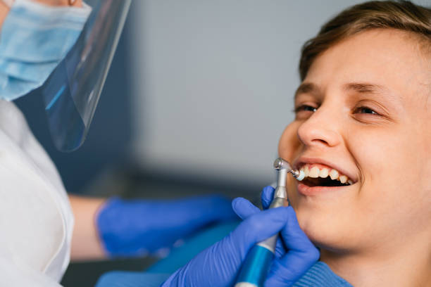 istock dentistry, cavity prevention, dentist at work 1181217838
