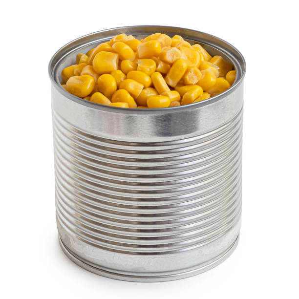 istock Canned sweet corn in an open metal tin isolated on white. 1181217865
