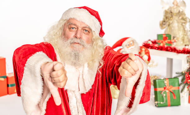 istock Santa Claus showing thumbs down sign with two hands 1181219573