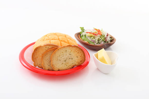 Fresh vegetable salad and breads