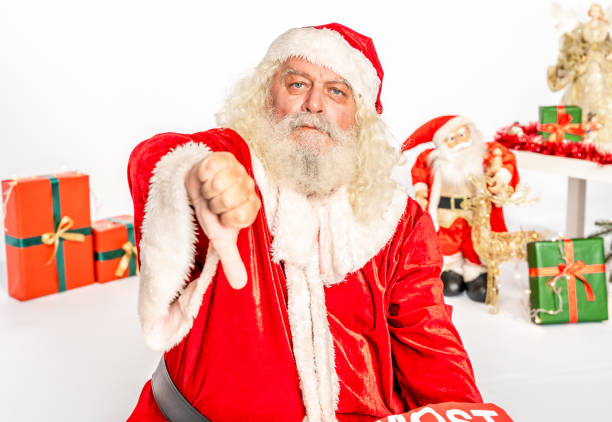 istock Angry Santa Claus use thumbs down sign 1181220993