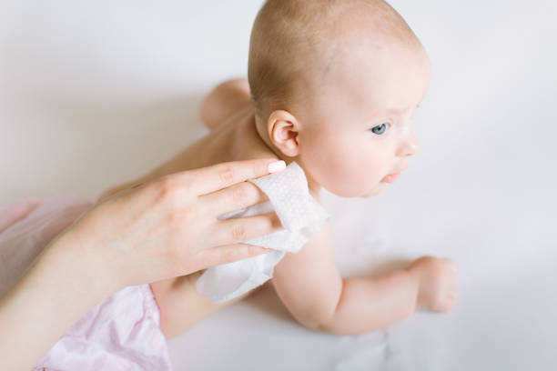istock Mother Wiping Baby's shoulder 1181221487