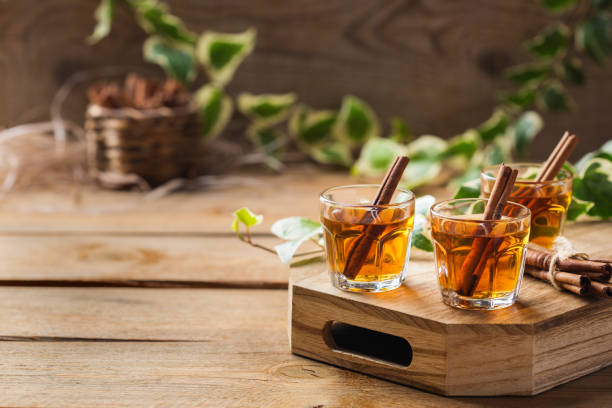 istock Shot with strong alcohol and cinnamon stick 1181222914