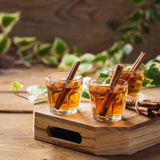 istock Shot with strong alcohol and cinnamon stick 1181222929