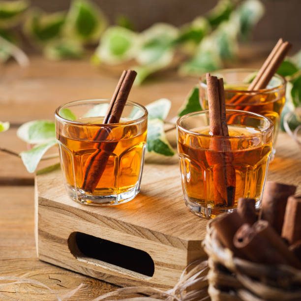 istock Shot with strong alcohol and cinnamon stick 1181222943