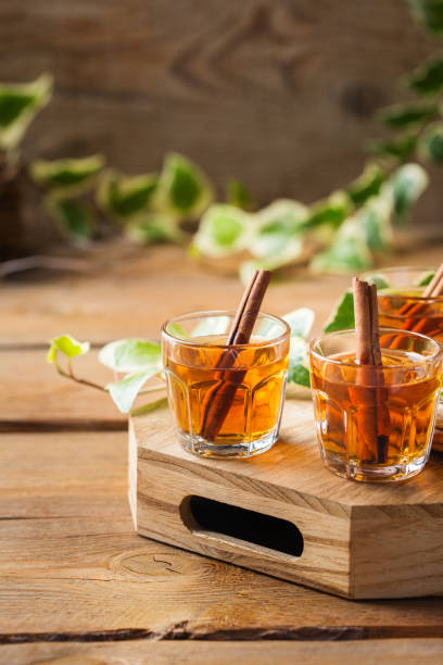 istock Shot with strong alcohol and cinnamon stick 1181223041