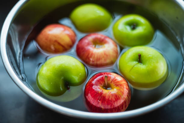 istock red apple and green apple cleaning in a bowl 1181223201