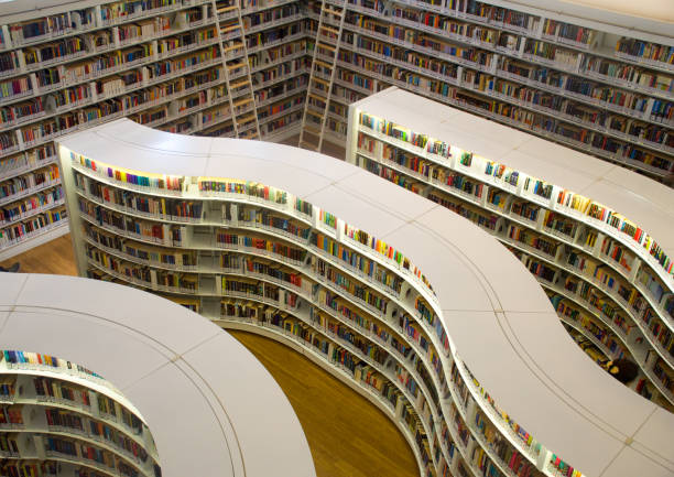 Singapore - 12 OCT 2019: The unique curved shelves library is solution for people, as it is about space, form and design and is conceived as public library. The intention was to create a new experience that blended the tactile quality of printed publications with the opportunities presented by new media. It is located at Orchard Gateway.