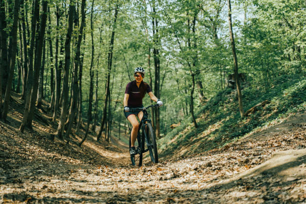 istock Women is riding on bicycle. 1181231346